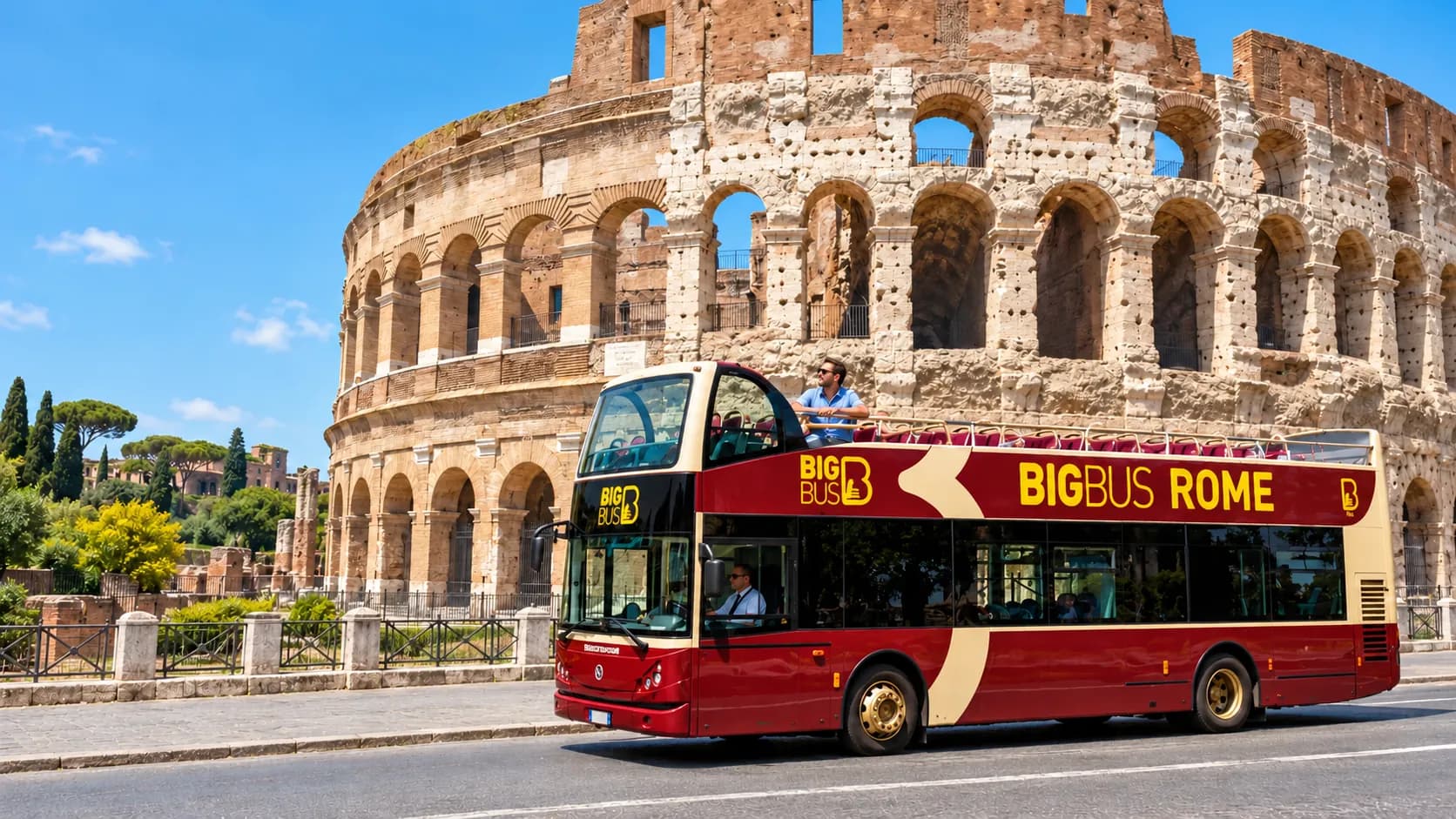 Rome sightseeing bus with a passenger on its open upper deck beside the Colosseum